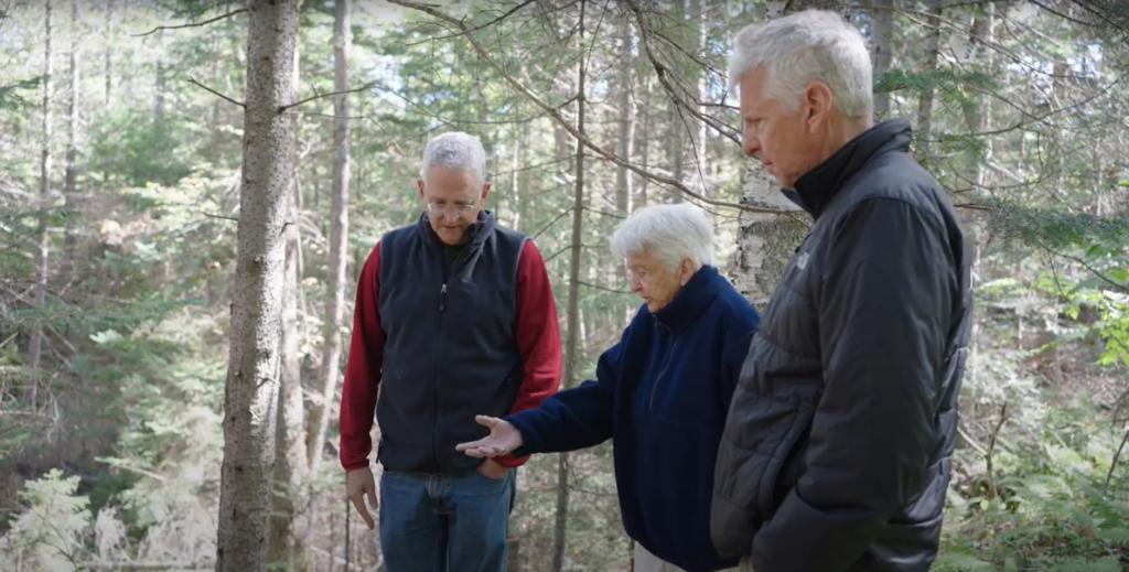 A photo of Tim Stout with members of his family on Jockey Hill Farm in Vermont